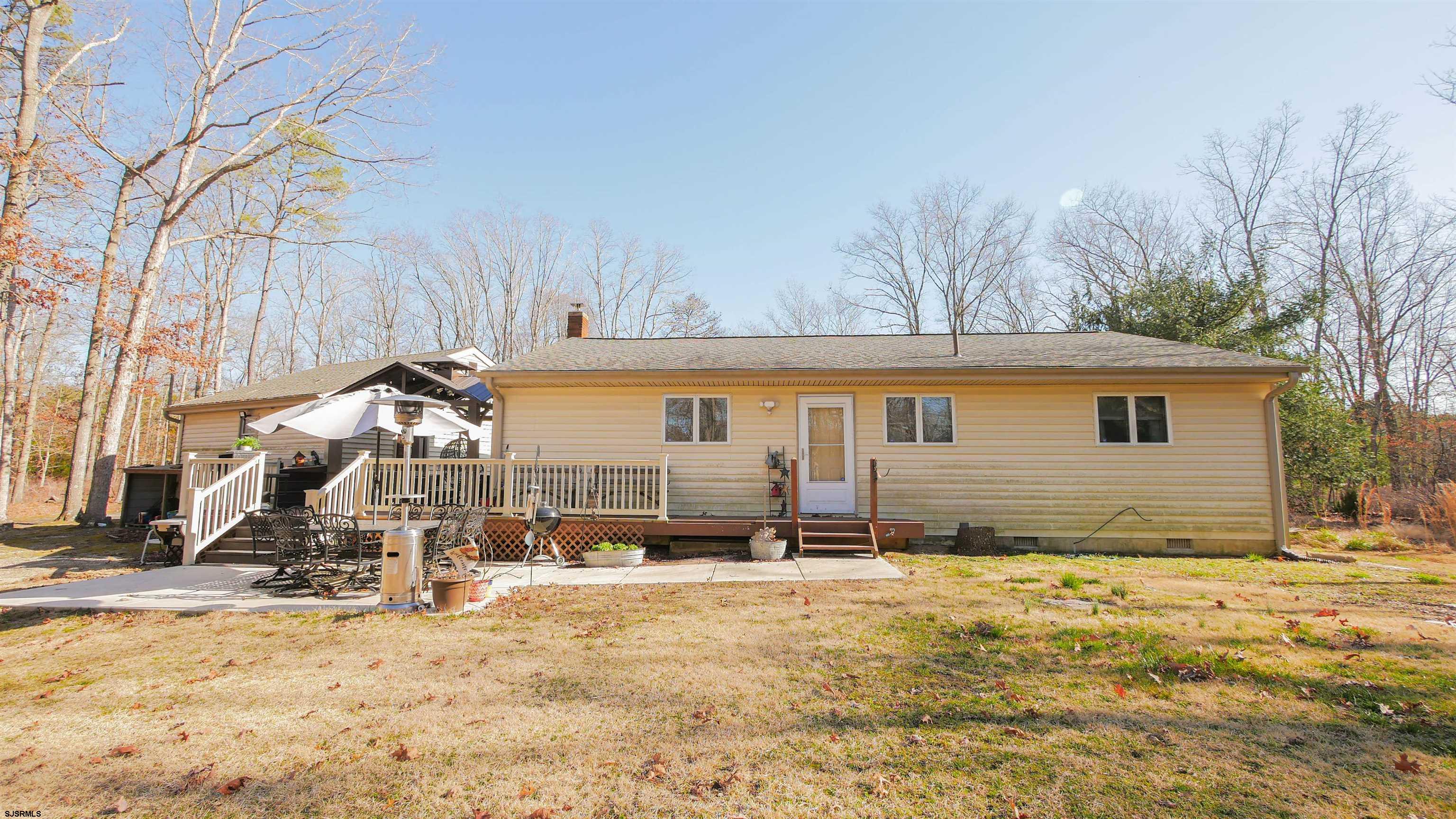 337 Broad Street Milmay, NJ 08330 - Photo 7 of 36 a view of a house with snow on the ground