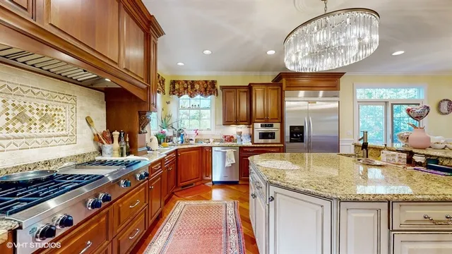 a bedroom with furniture and a wooden floor