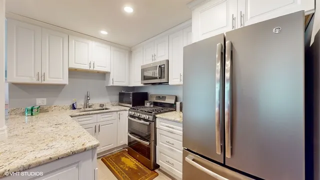a view of field with trees in the background