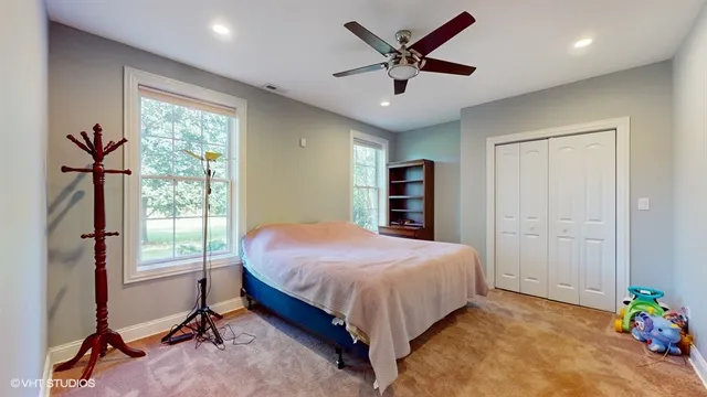 a view of a lake with a building in the background