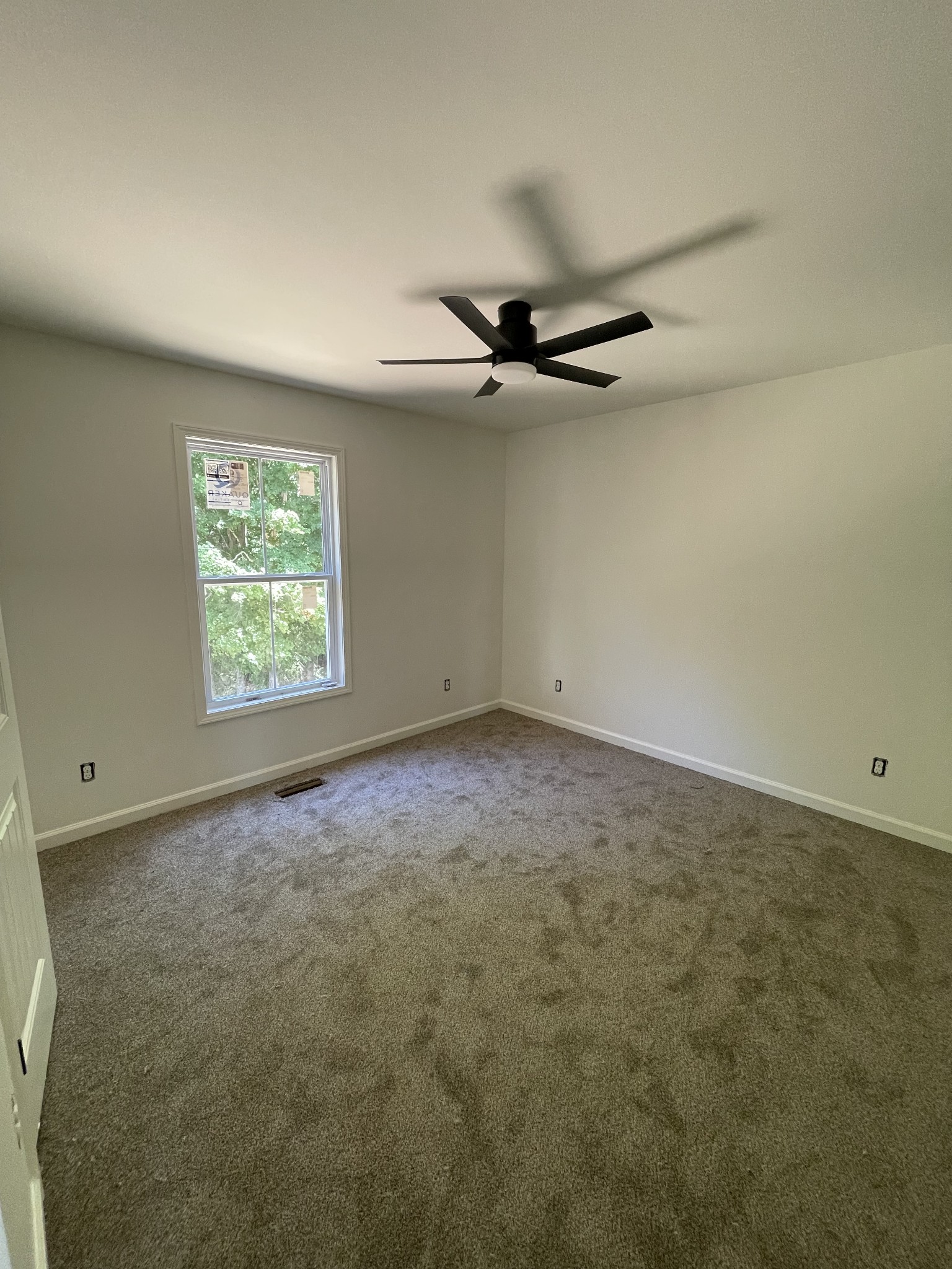 2798 Highland Road Red Boiling Springs, TN 37150 - Photo 8 of 9 an empty room with windows