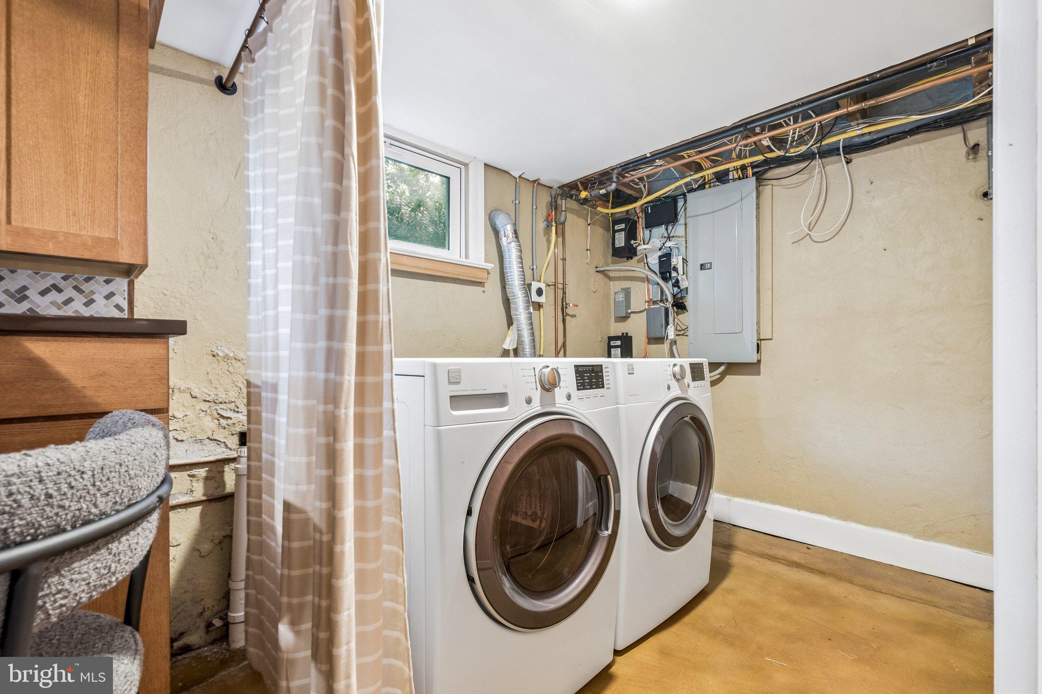 9 Doyle Road Wayne, PA 19087 - Photo 19 of 33 a utility room with dryer and washer