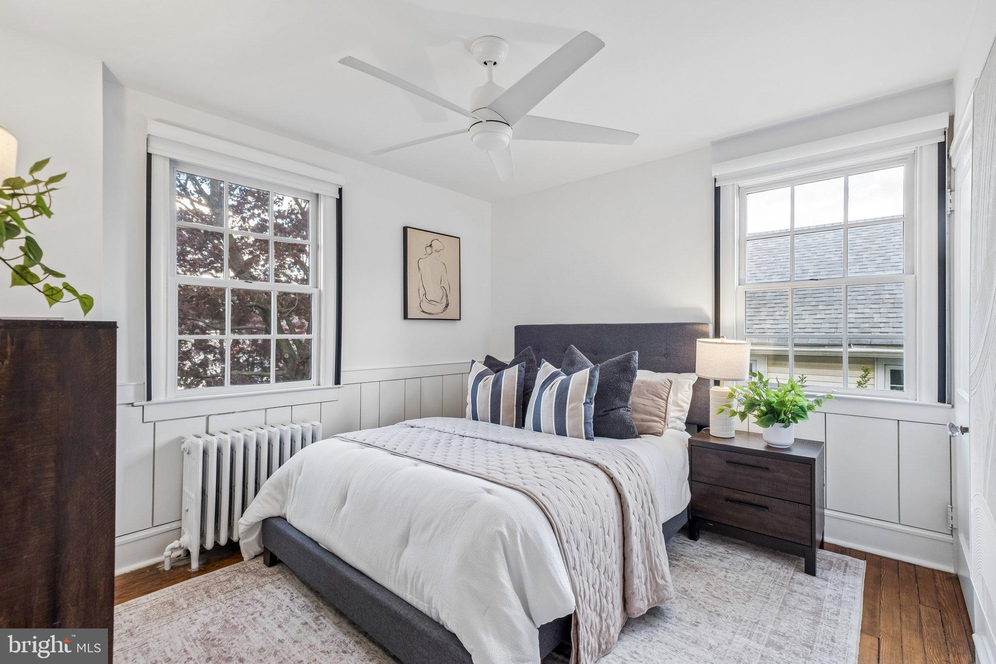 9 Doyle Road Wayne, PA 19087 - Photo 22 of 33 a bed sitting in a bedroom next to a window