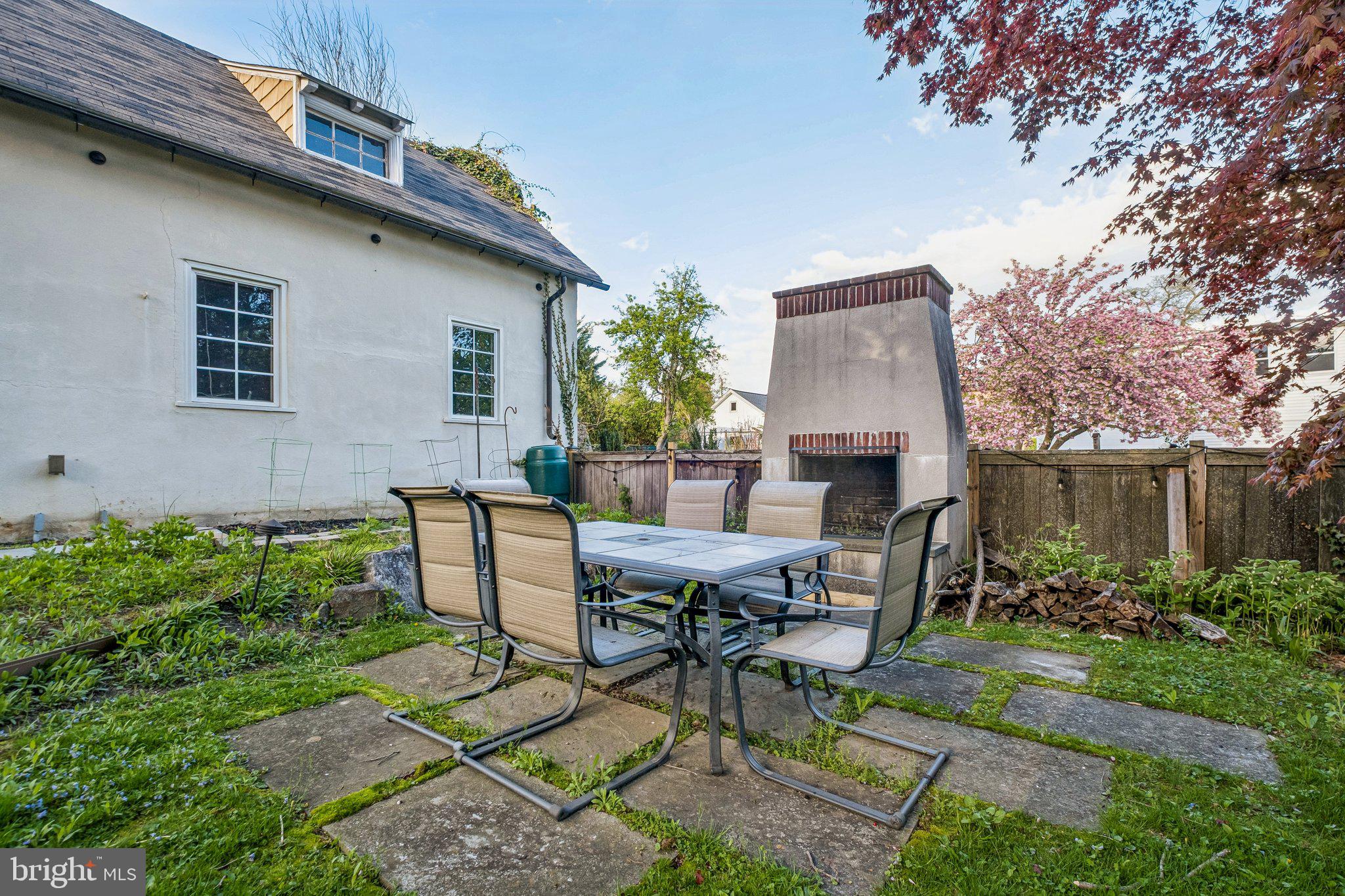 9 Doyle Road Wayne, PA 19087 - Photo 32 of 33 a view of a patio with table and chairs and potted plants