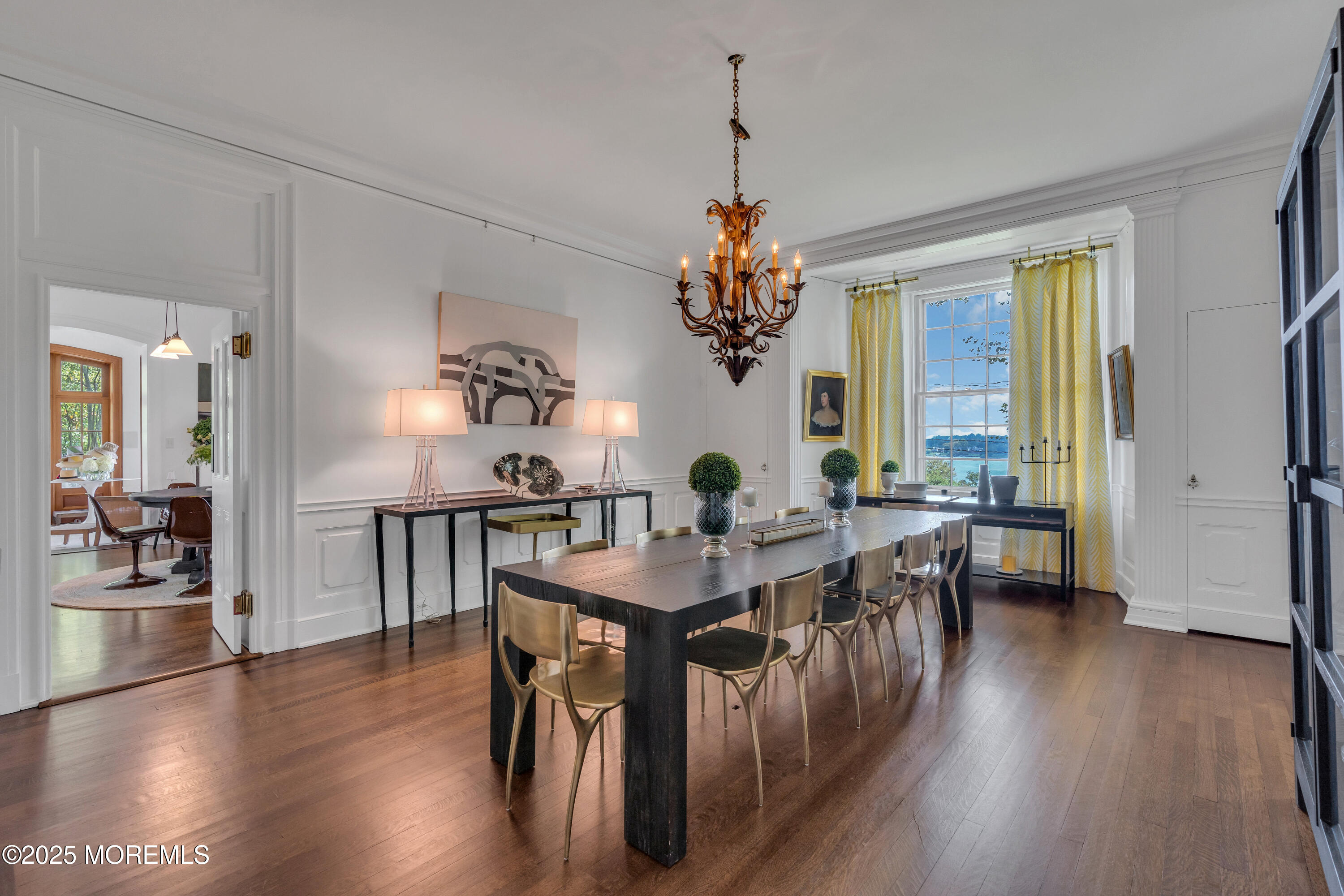 809 Navesink River Road Rumson, NJ 07760 - Photo 16 of 45 a view of a dining room with furniture window and wooden floor