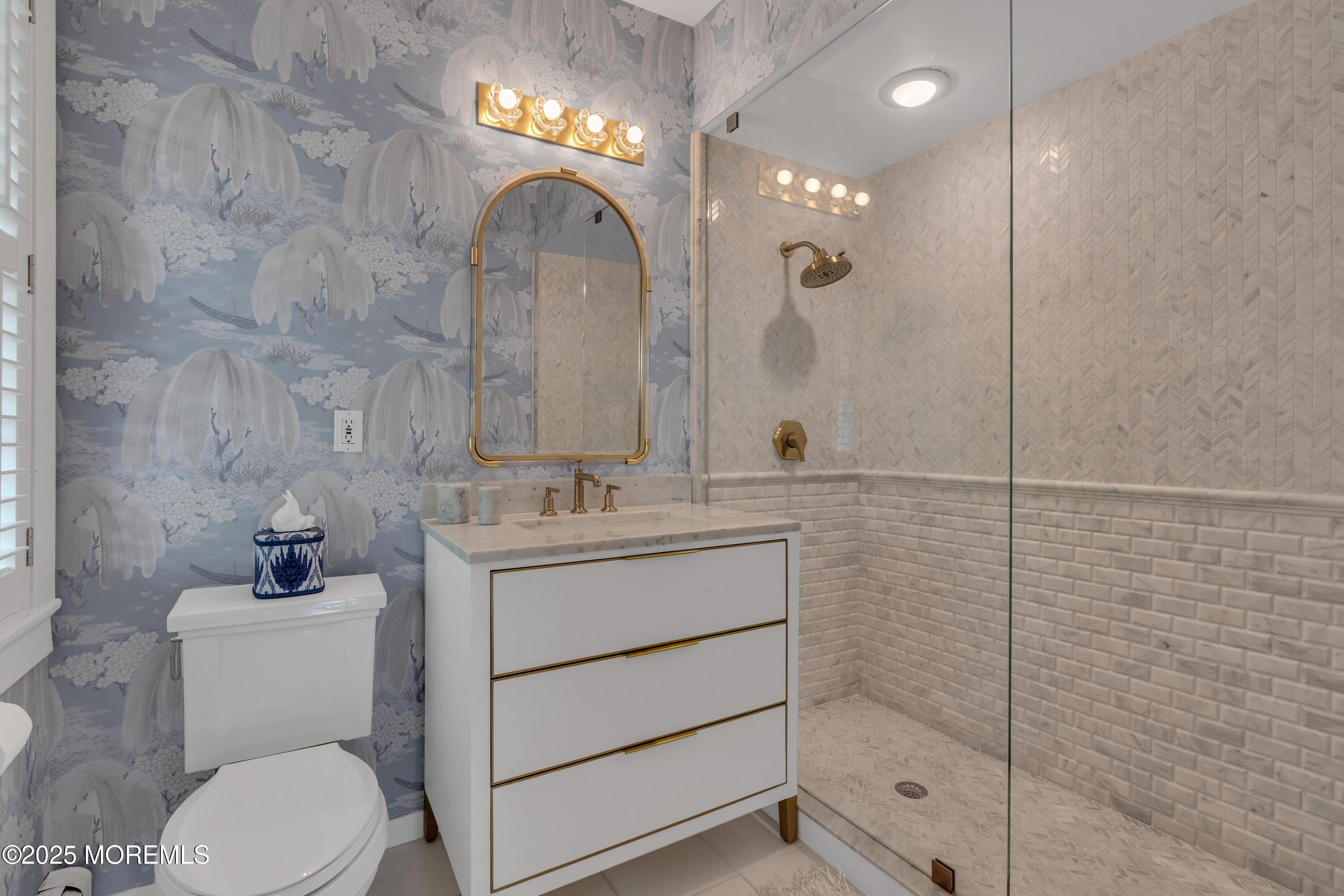 809 Navesink River Road Rumson, NJ 07760 - Photo 24 of 45 a bathroom with a sink a toilet and shower