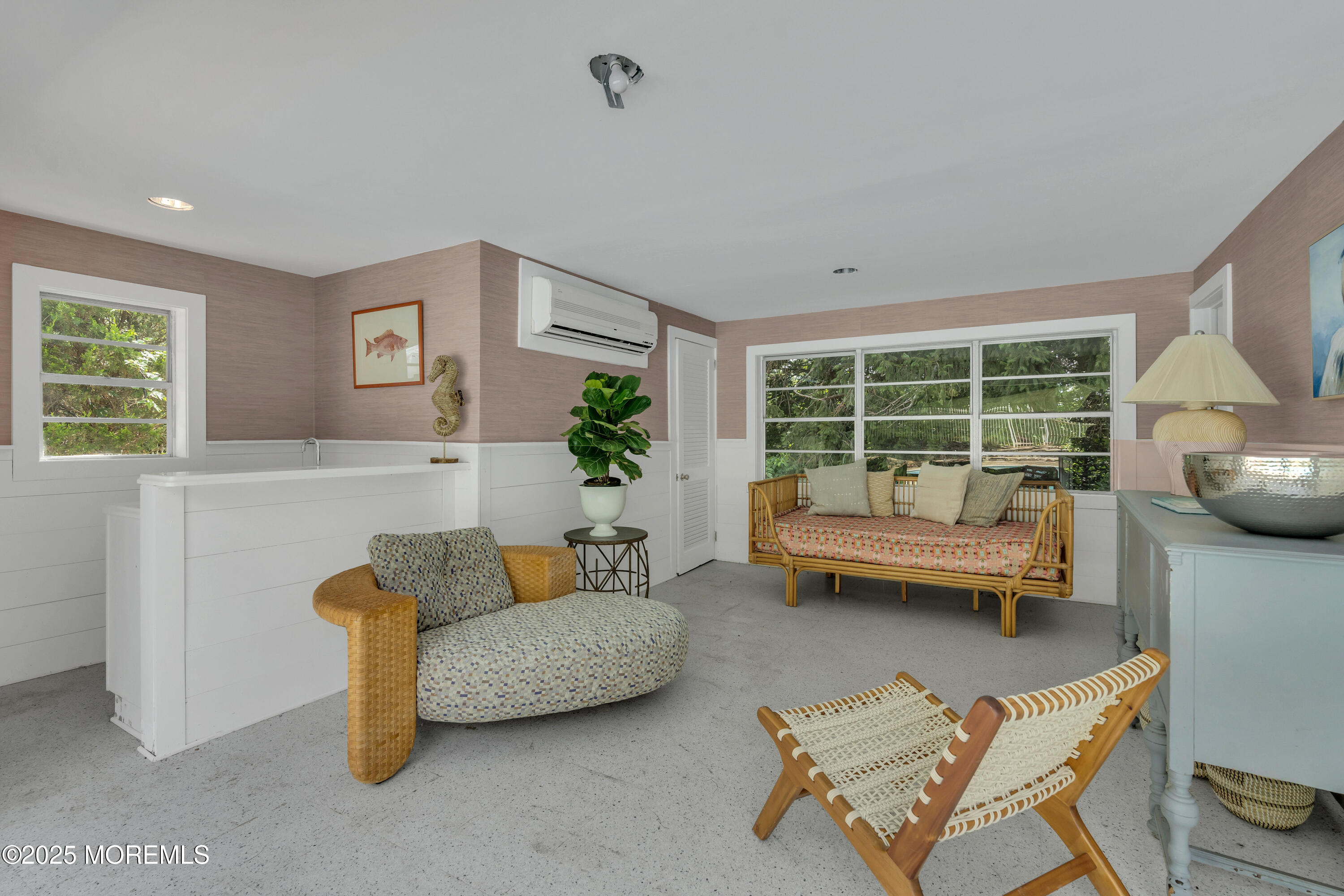 809 Navesink River Road Rumson, NJ 07760 - Photo 29 of 45 a living room with furniture and a table