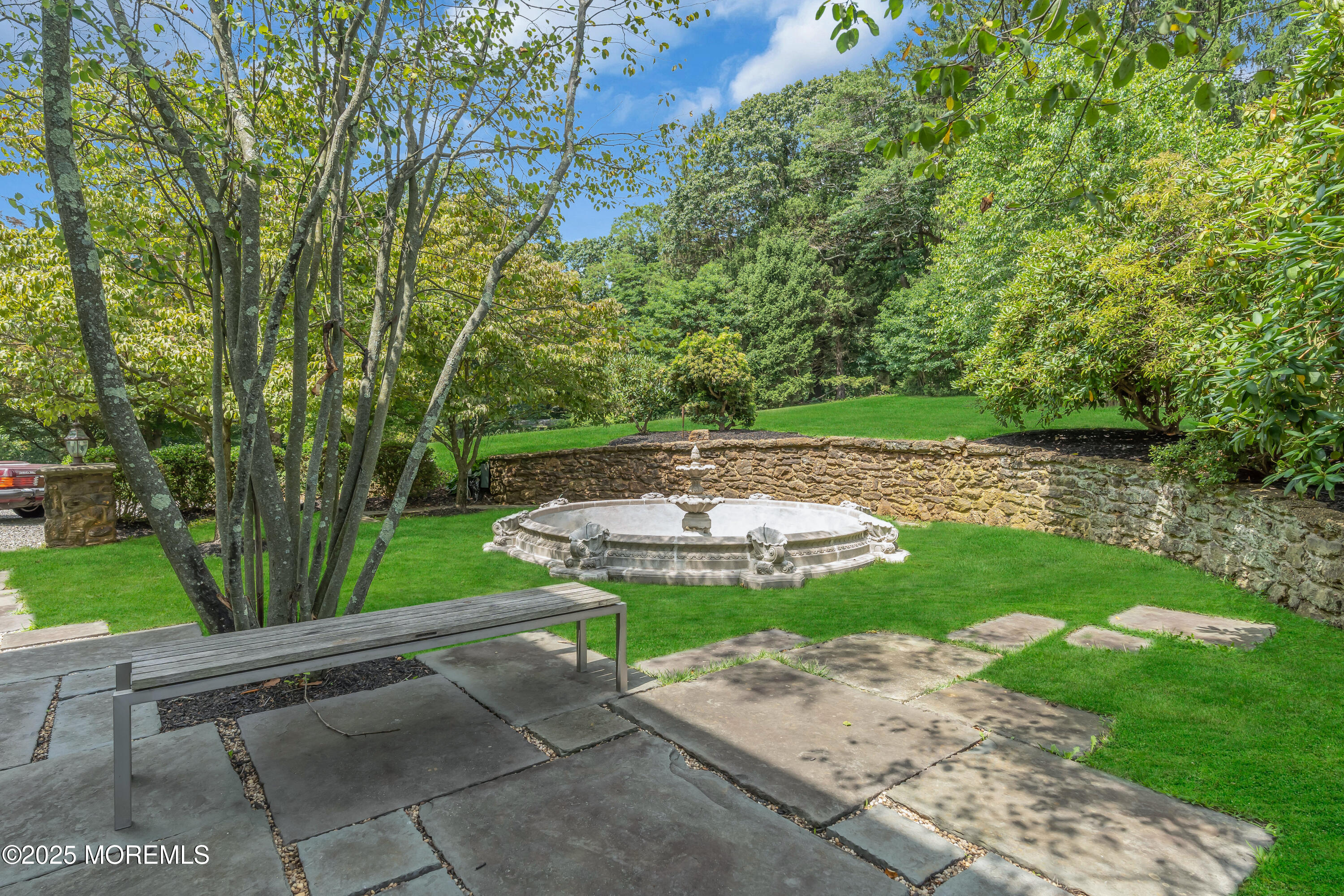 809 Navesink River Road Rumson, NJ 07760 - Photo 36 of 45 a view of a backyard with sitting area