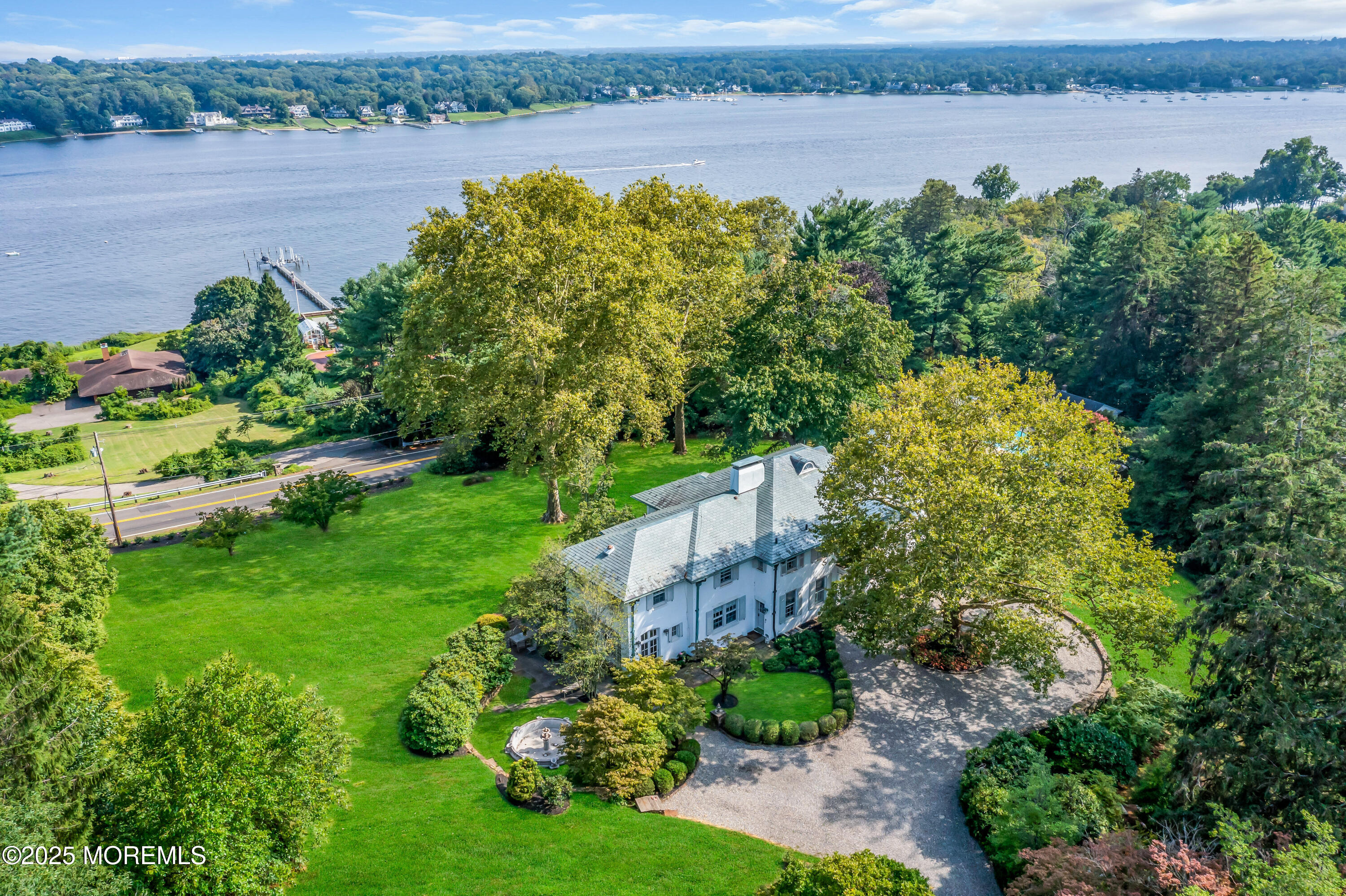 809 Navesink River Road Rumson, NJ 07760 - Photo 37 of 45 an aerial view of a houses with lake view
