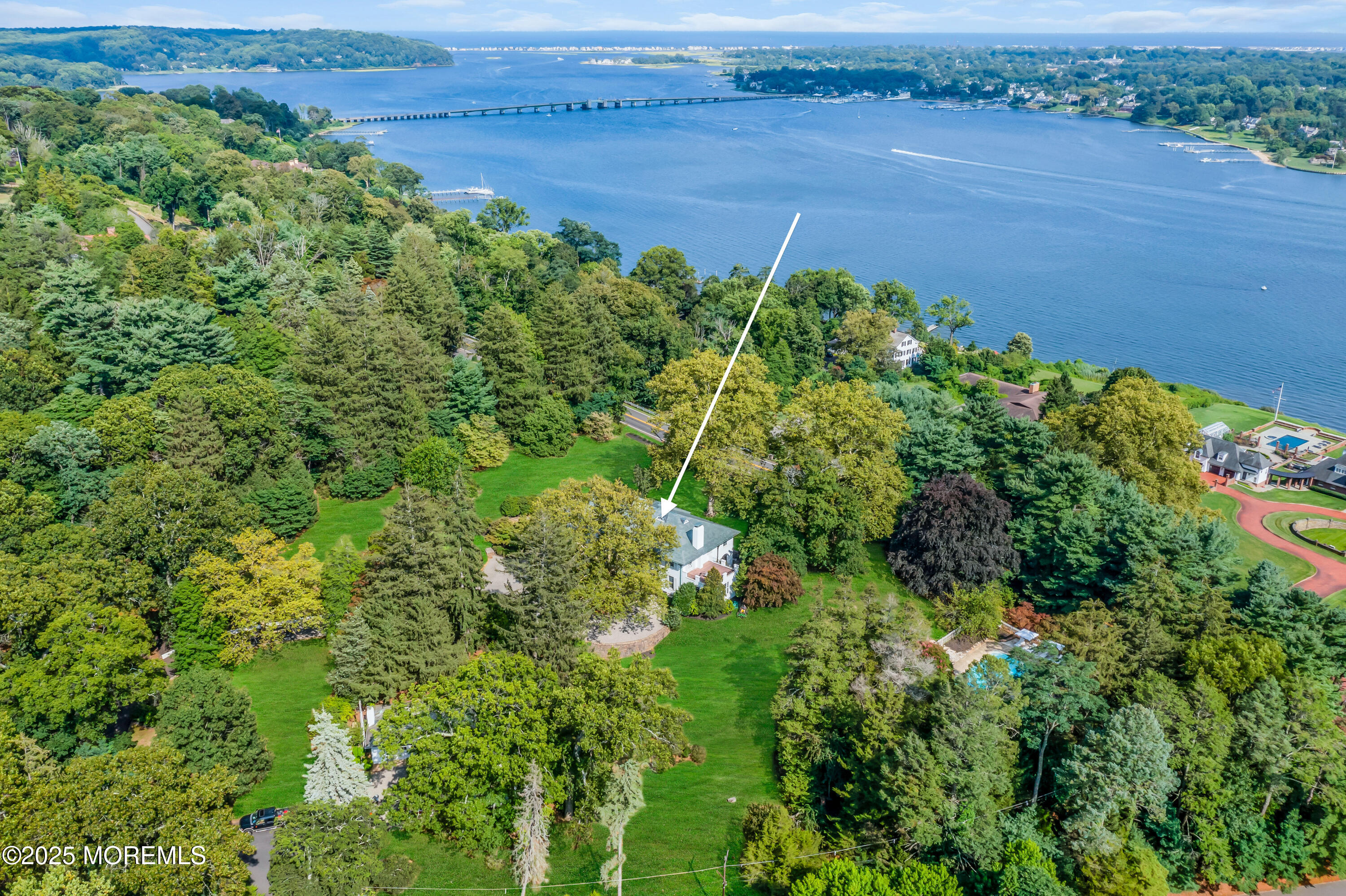 809 Navesink River Road Rumson, NJ 07760 - Photo 40 of 45 an aerial view of a house with a yard