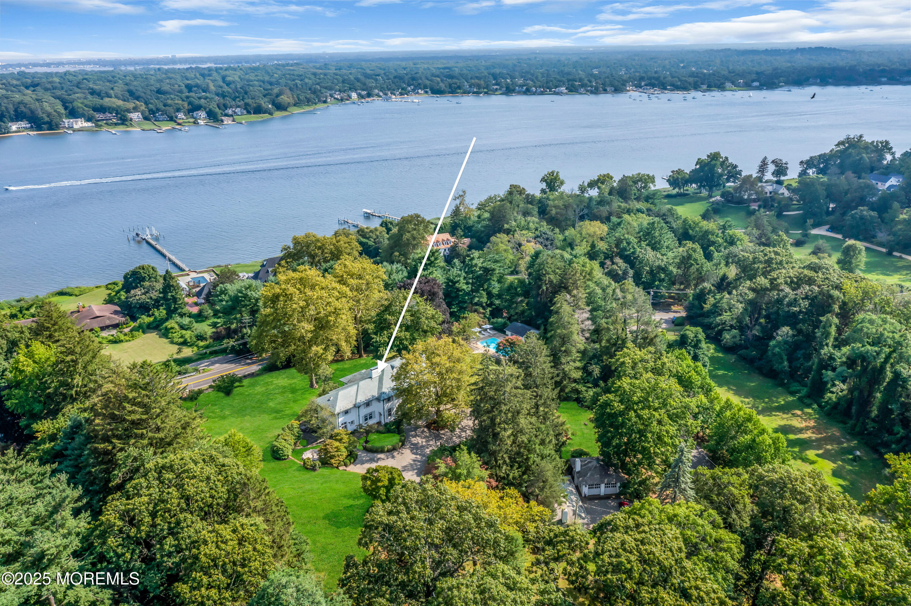 809 Navesink River Road Rumson, NJ 07760 - Photo 41 of 45 a view of a lake from a yard