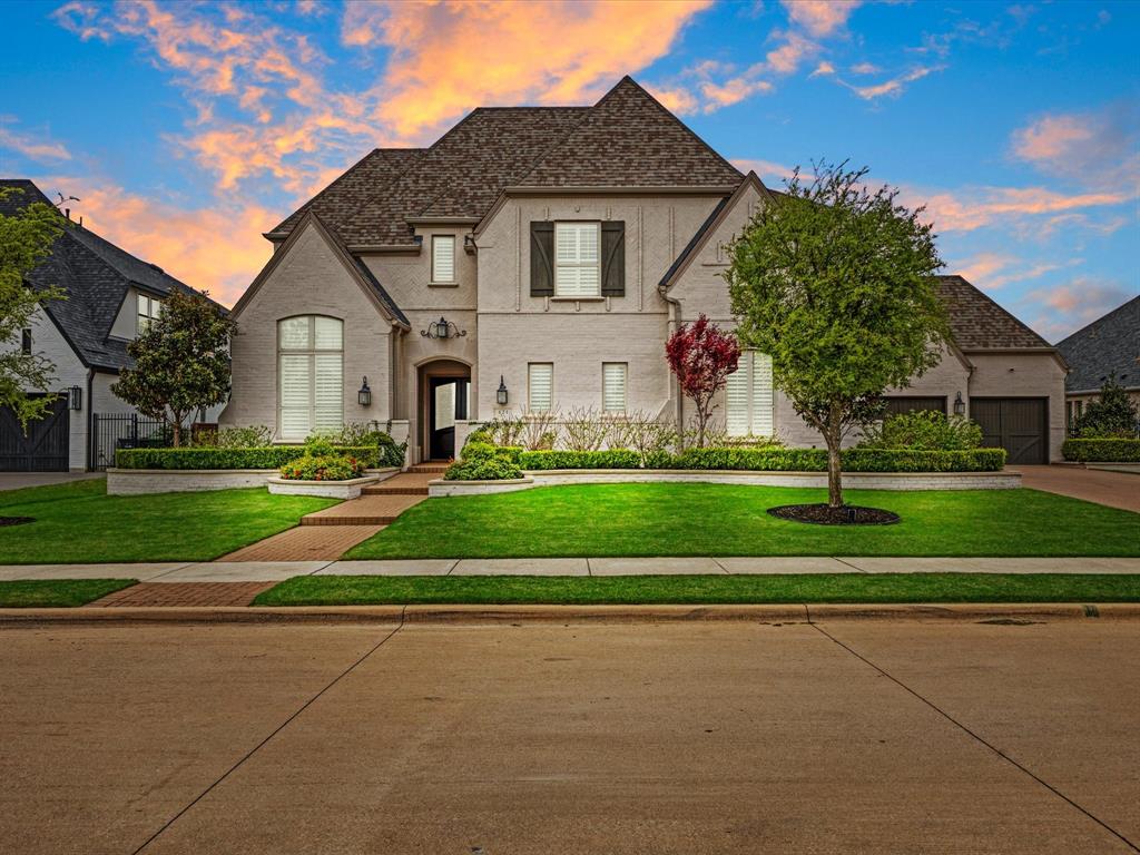621 Hawk Wood Lane Prosper, TX 75078 - Photo 1 of 40 a front view of a house with a yard