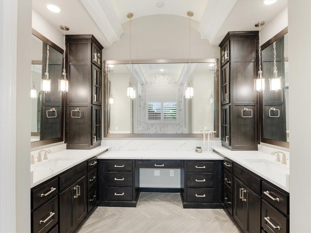 621 Hawk Wood Lane Prosper, TX 75078 - Photo 20 of 40 a bathroom with a double vanity sink and a mirror