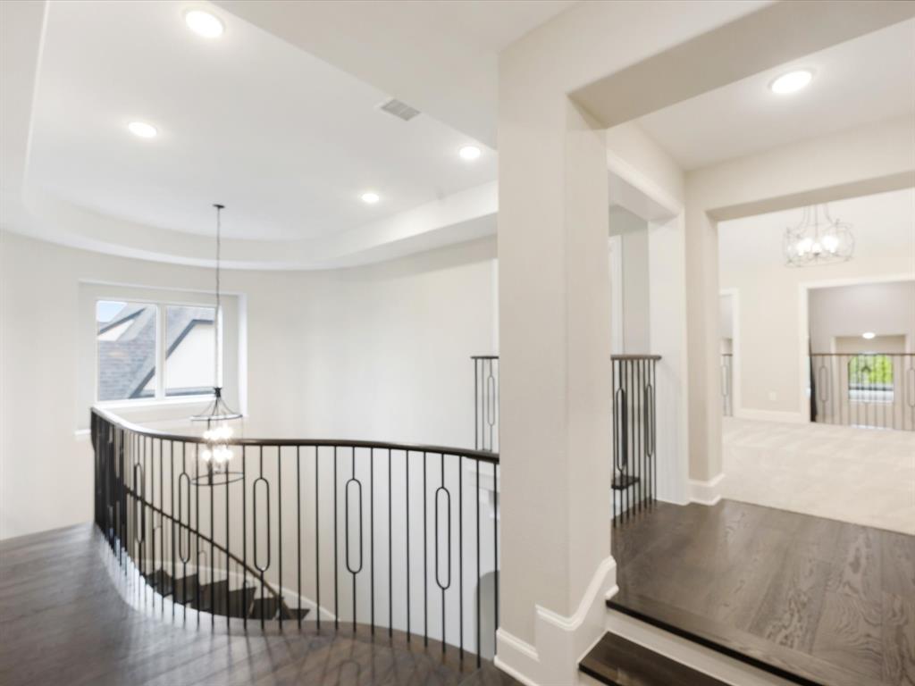 621 Hawk Wood Lane Prosper, TX 75078 - Photo 25 of 40 a view of a hallway