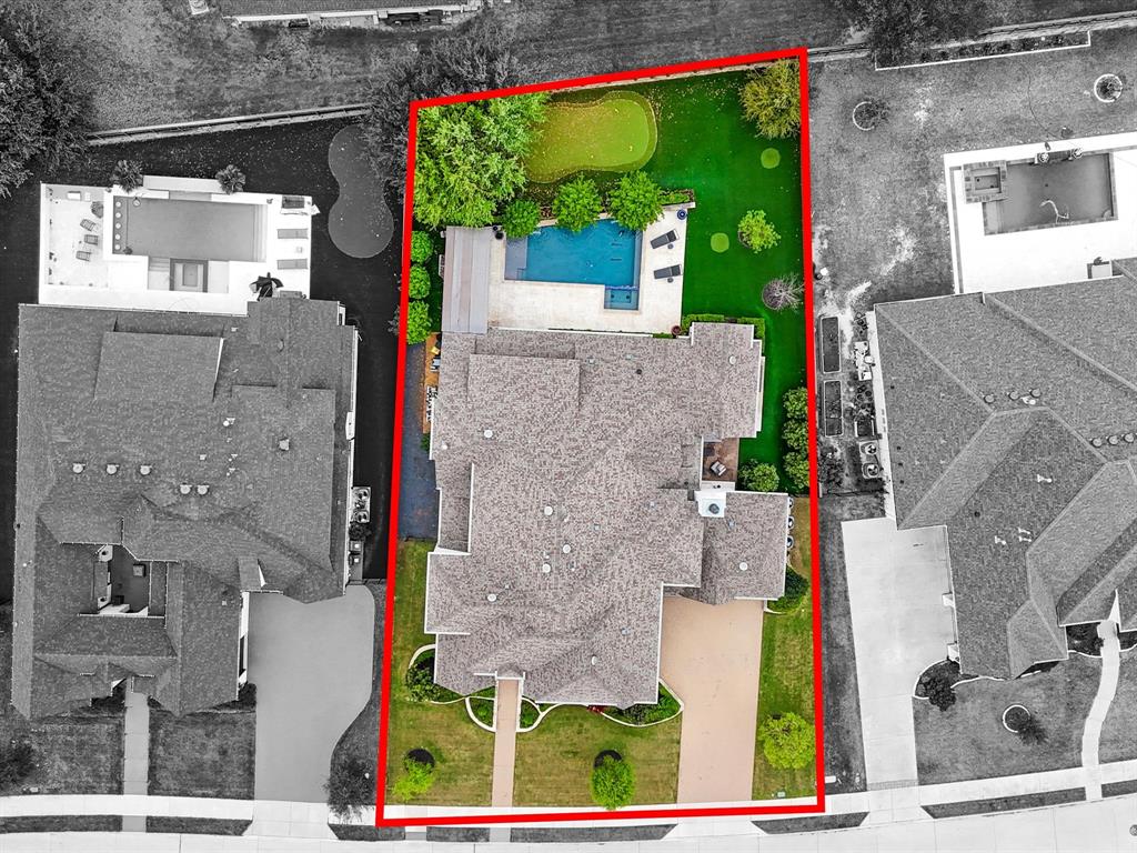 621 Hawk Wood Lane Prosper, TX 75078 - Photo 37 of 40 a aerial view of a house with a yard and potted plants