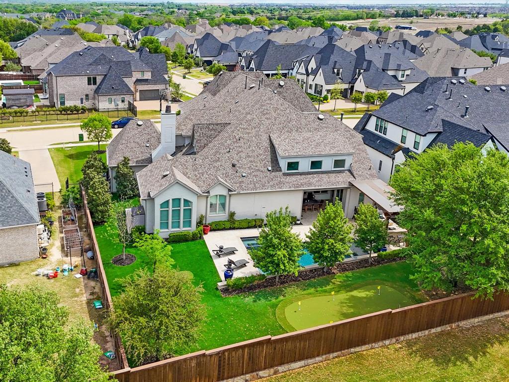 621 Hawk Wood Lane Prosper, TX 75078 - Photo 38 of 40 an aerial view of a house with a garden