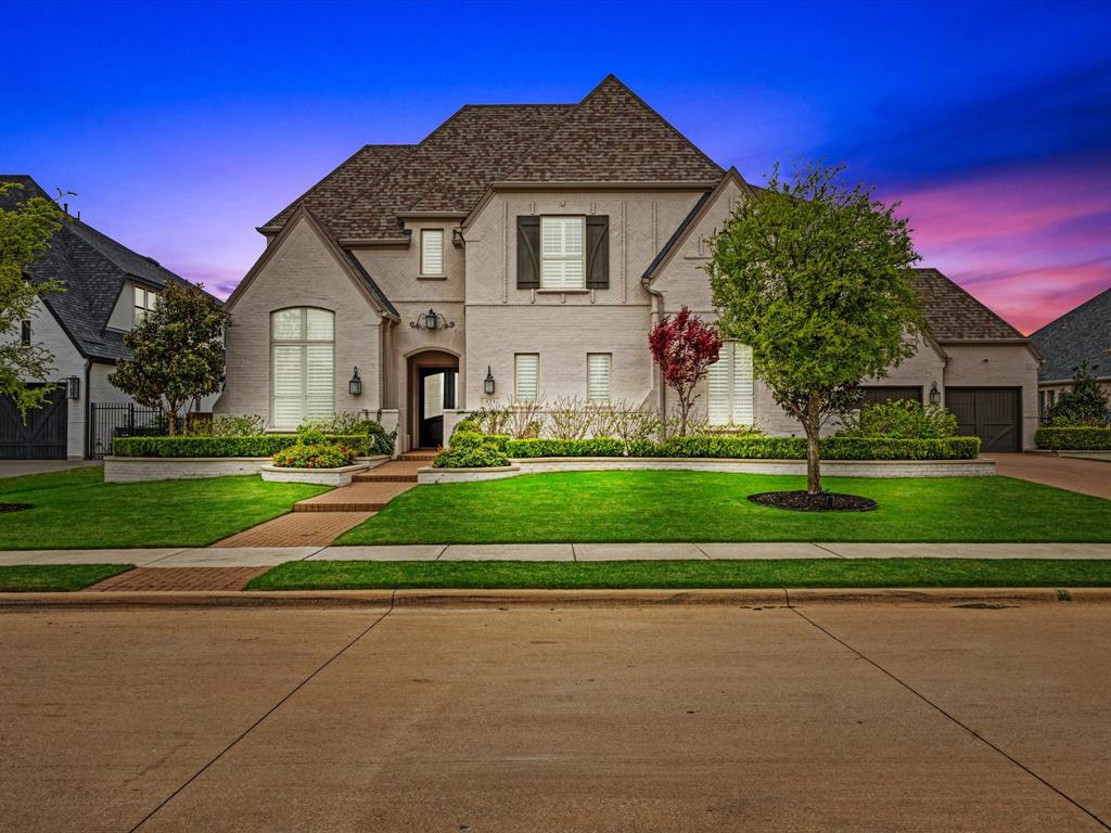 621 Hawk Wood Lane Prosper, TX 75078 - Photo 40 of 40 a front view of a house with a yard