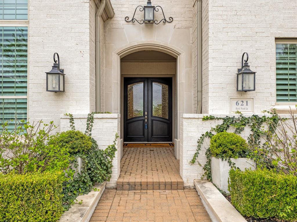 621 Hawk Wood Lane Prosper, TX 75078 - Photo 4 of 40 a front view of a house with a garden