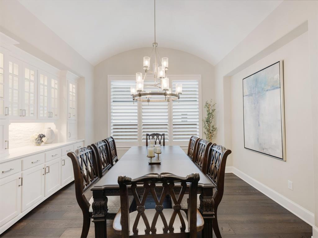 621 Hawk Wood Lane Prosper, TX 75078 - Photo 8 of 40 a view of a dining room with furniture window and wooden floor