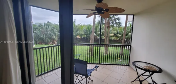 a porch area with a large window