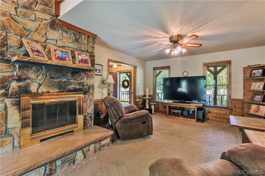 15100 Beach Road Chesterfield, VA 23838 - Photo 15 of 41 a living room with furniture and a flat screen tv