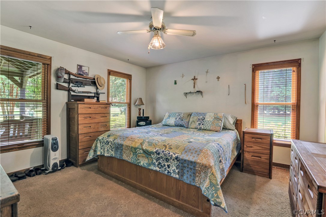 15100 Beach Road Chesterfield, VA 23838 - Photo 17 of 41 a bedroom with a bed dresser and a window