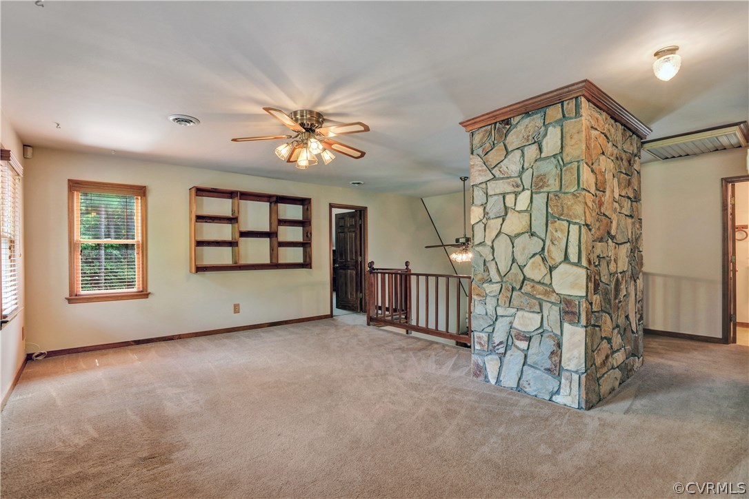 15100 Beach Road Chesterfield, VA 23838 - Photo 18 of 41 an empty room with windows and chandelier fan