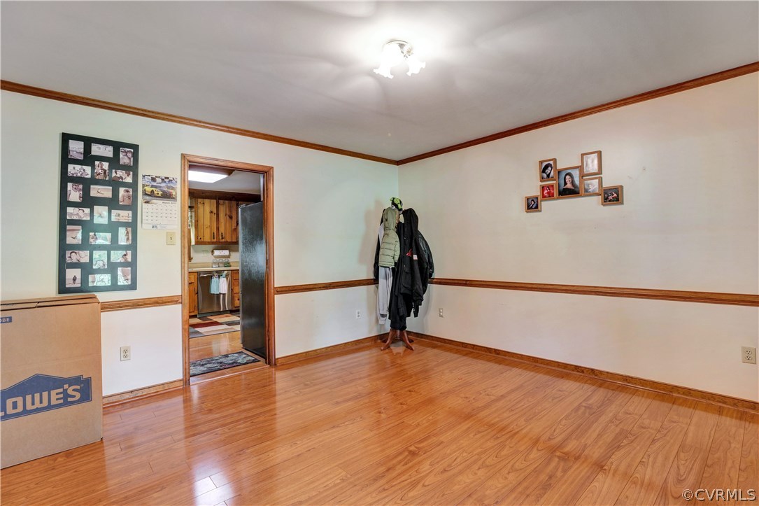 15100 Beach Road Chesterfield, VA 23838 - Photo 3 of 41 a view of a room with gym equipment and a window