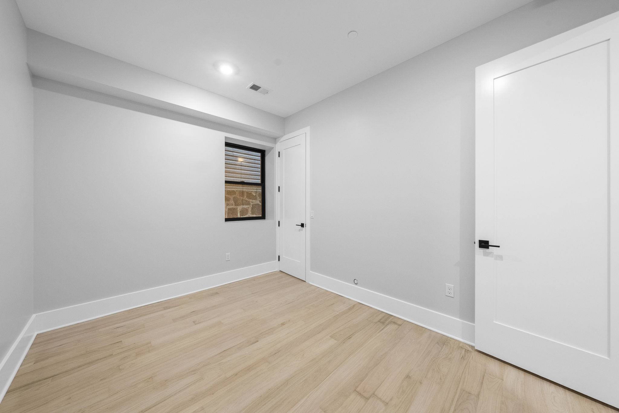 124 Glenwood Avenue Jersey City, NJ 07306 - Photo 23 of 42 wooden floor in a room