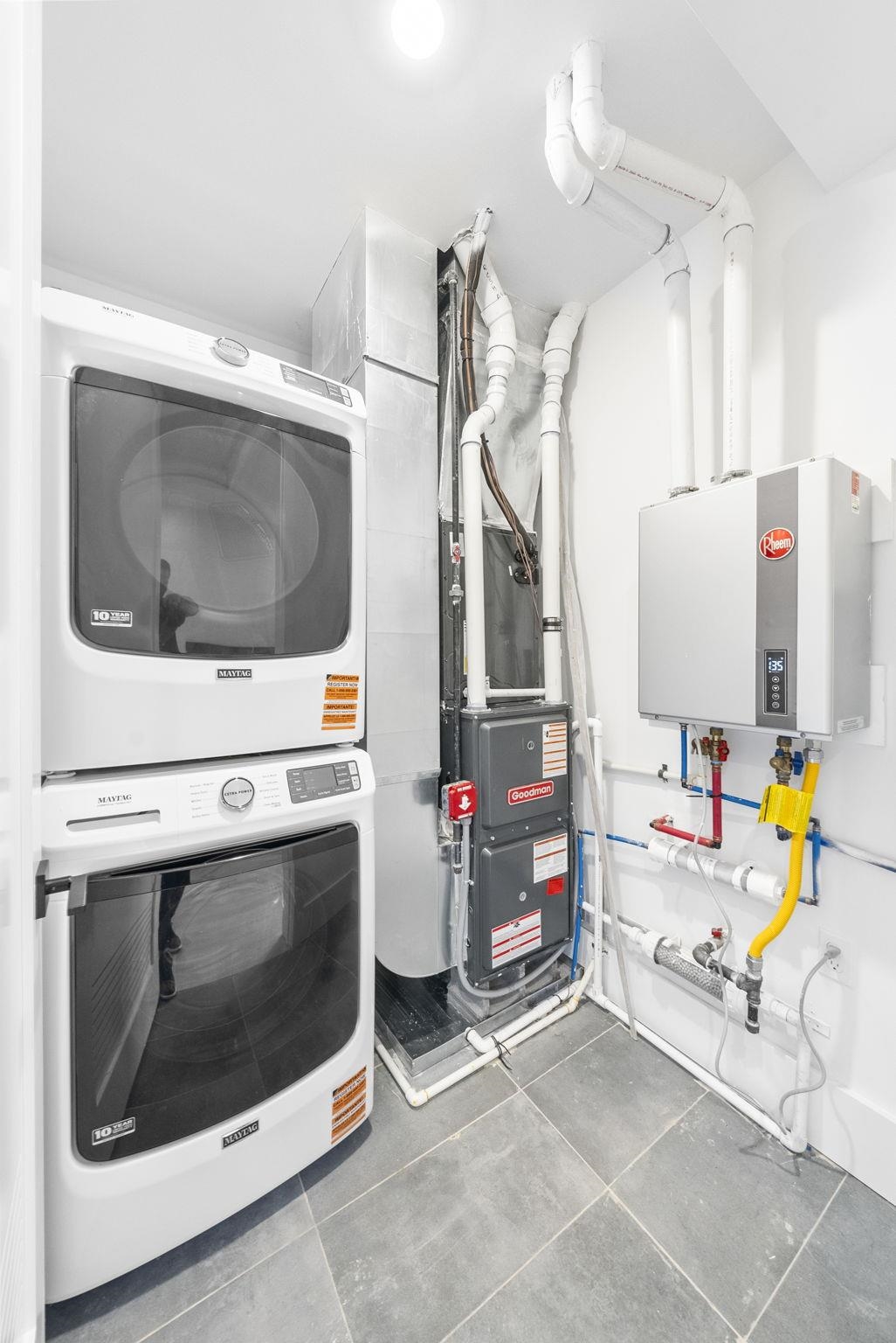 124 Glenwood Avenue Jersey City, NJ 07306 - Photo 30 of 42 a utility room with dryer and washer