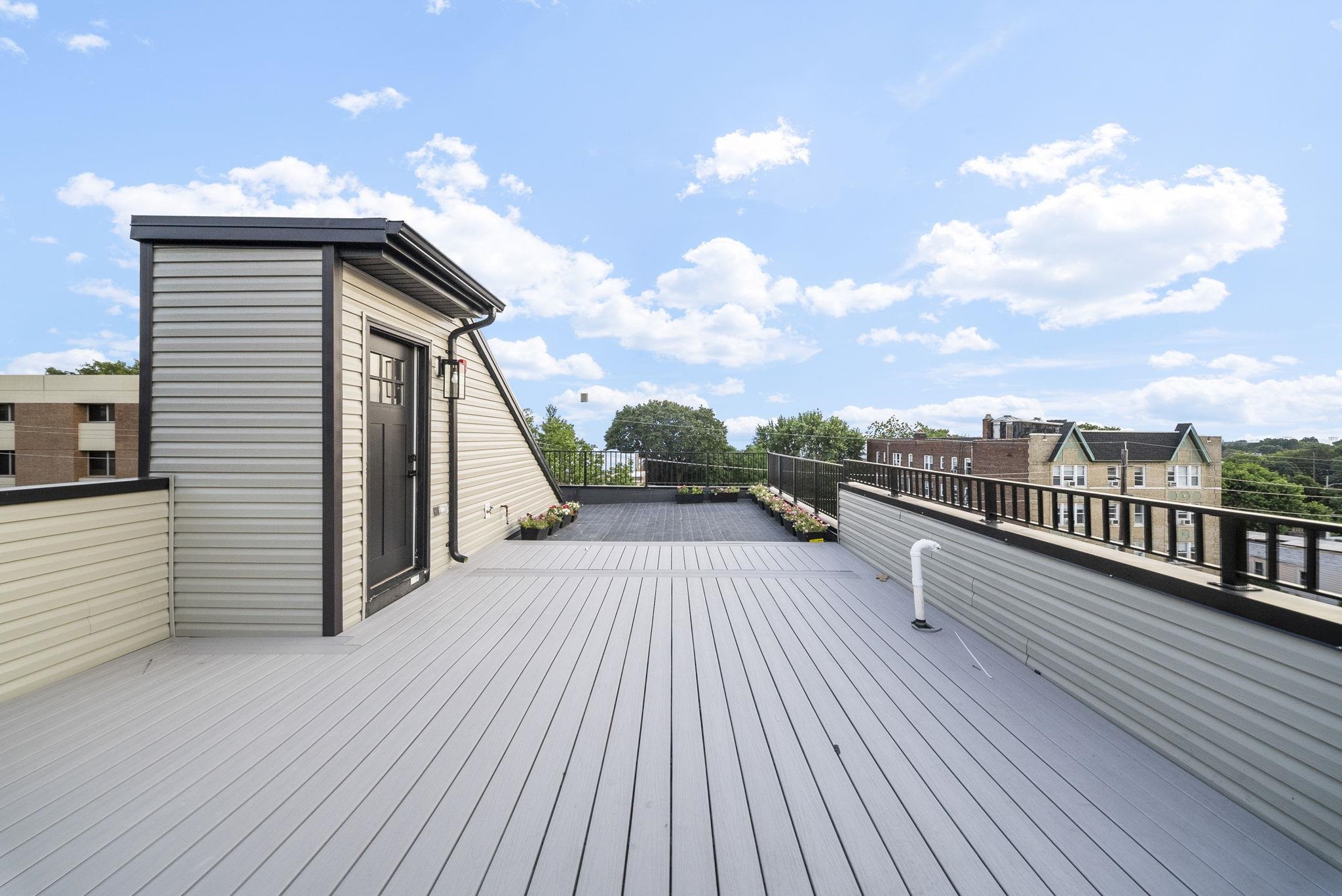 124 Glenwood Avenue Jersey City, NJ 07306 - Photo 34 of 42 a view of balcony and deck