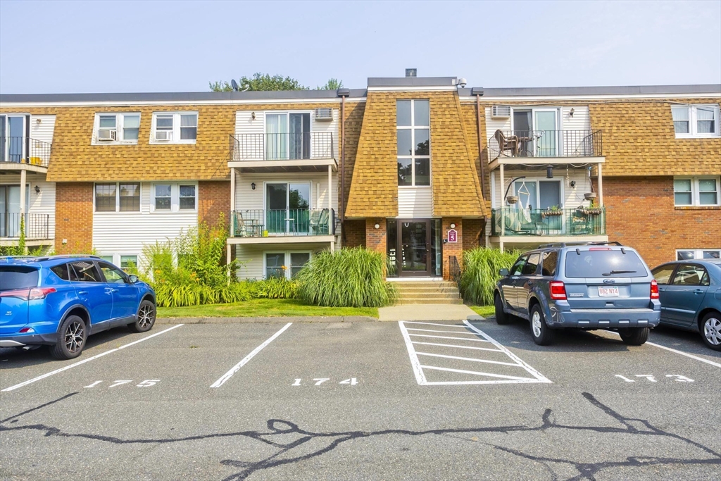 a cars parked in front of a building