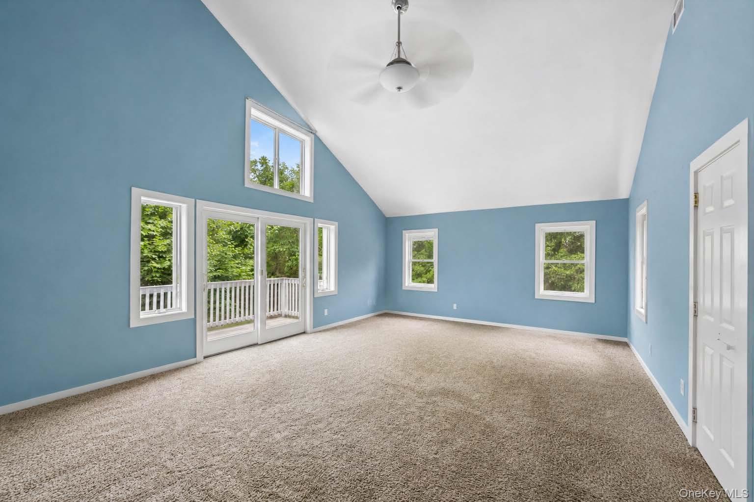 131 Red Creek Road Hampton Bays, NY 11946 - Photo 23 of 35 a view of an empty room with a window