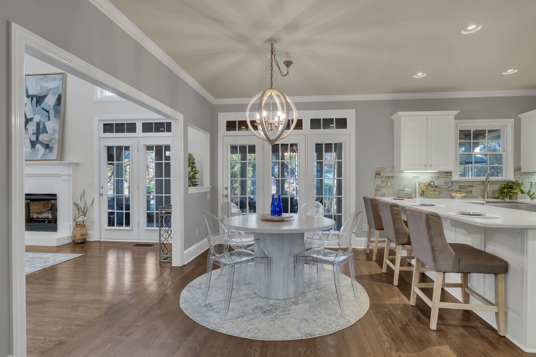 306 Rothwell Place Franklin, TN 37069 - Photo 22 of 91 a view of a dining room with furniture wooden floor and chandelier