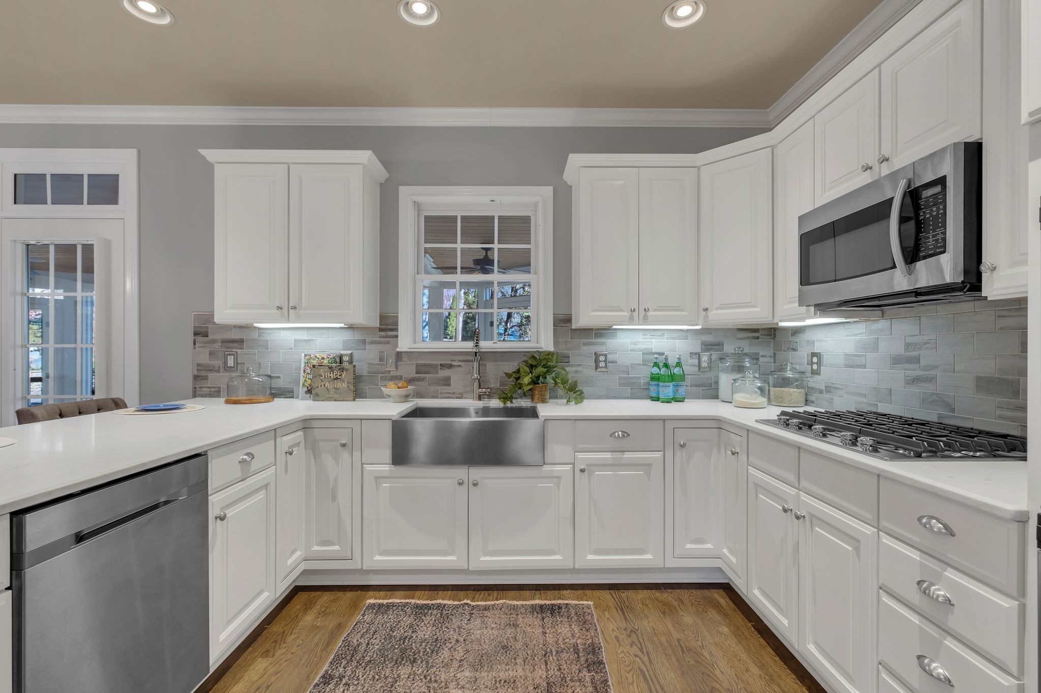 306 Rothwell Place Franklin, TN 37069 - Photo 25 of 91 a kitchen with stainless steel appliances granite countertop white cabinets granite counter tops and a window