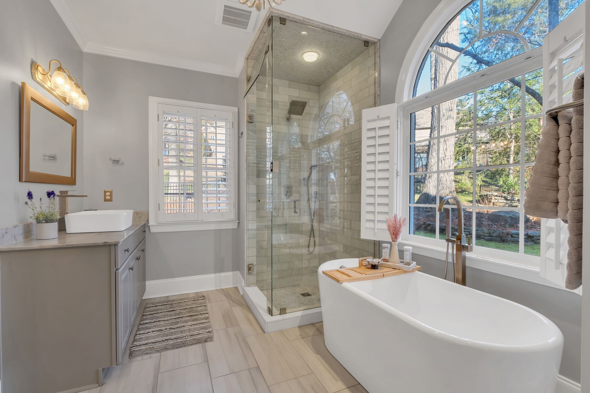306 Rothwell Place Franklin, TN 37069 - Photo 35 of 91 a bathroom with a granite countertop sink mirror bathtub and toilet