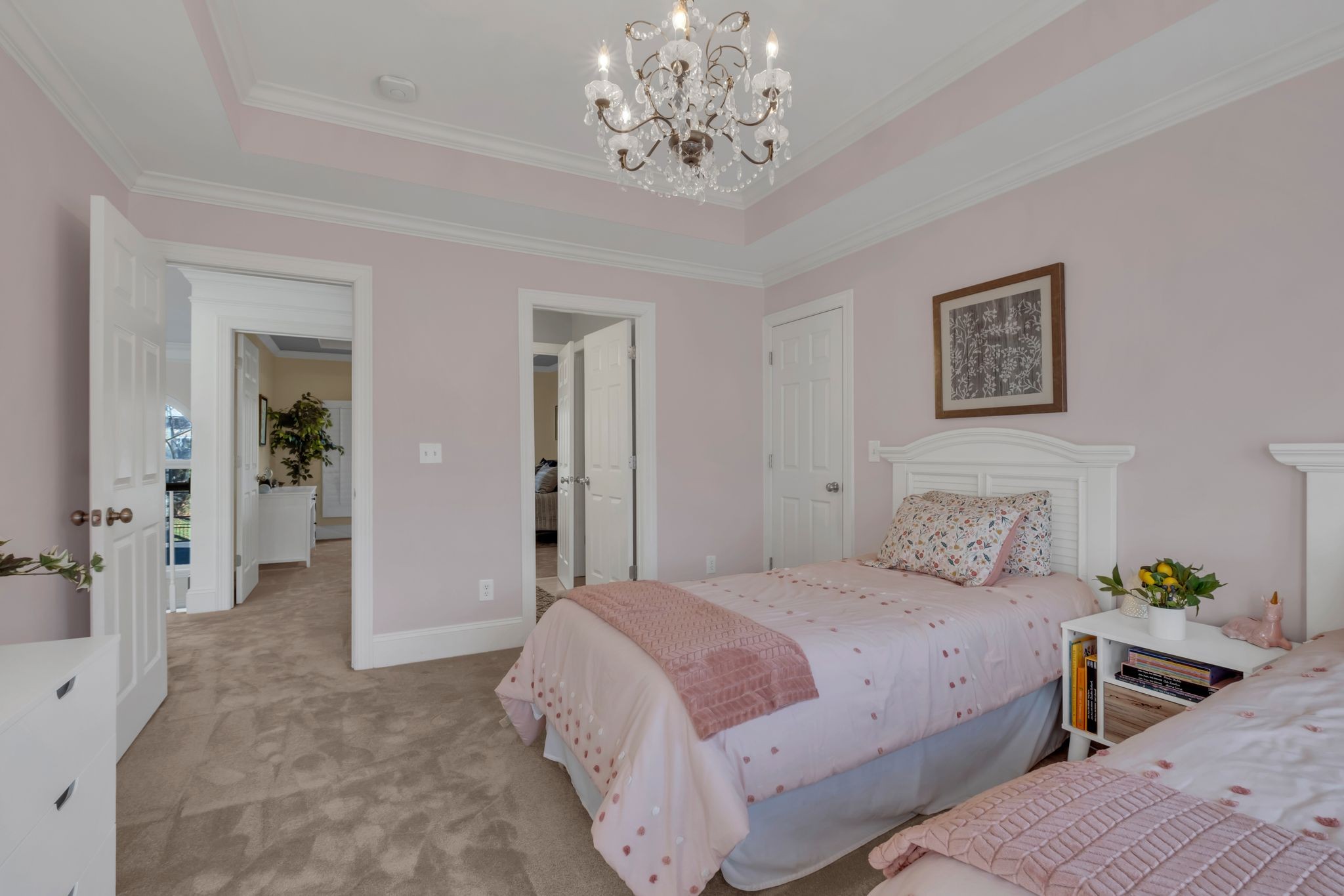 306 Rothwell Place Franklin, TN 37069 - Photo 54 of 91 a bedroom with a bed and a chandelier