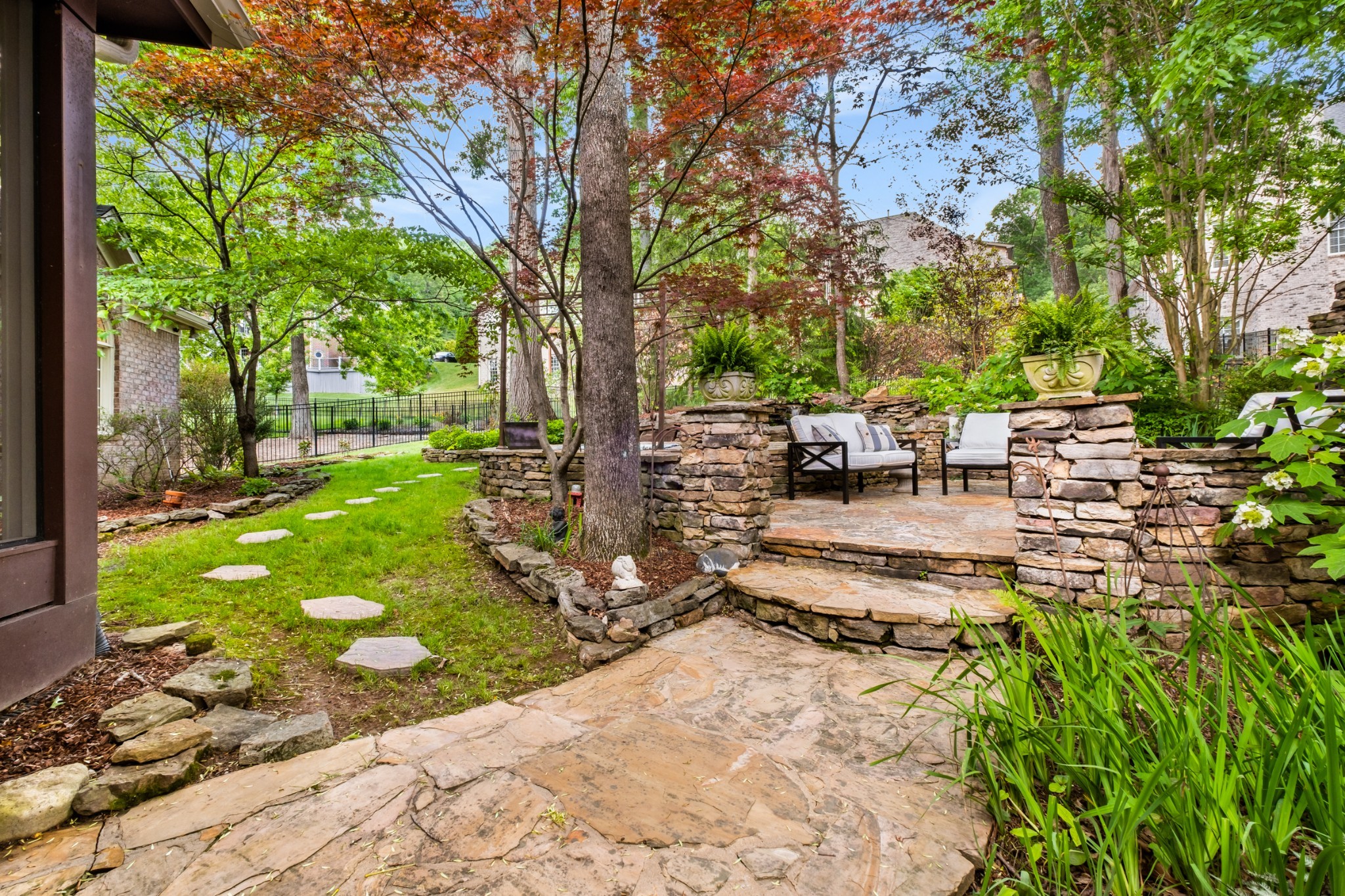 306 Rothwell Place Franklin, TN 37069 - Photo 7 of 91 a view of a backyard with sitting area