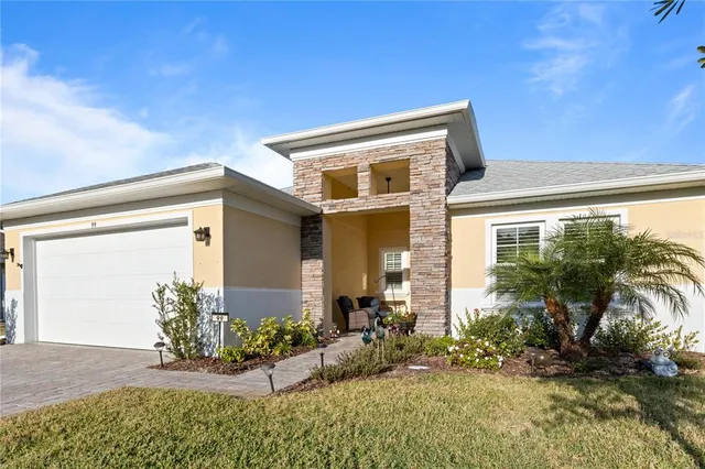 front view of a house with a yard