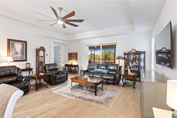 a living room with furniture or couch and a flat screen tv