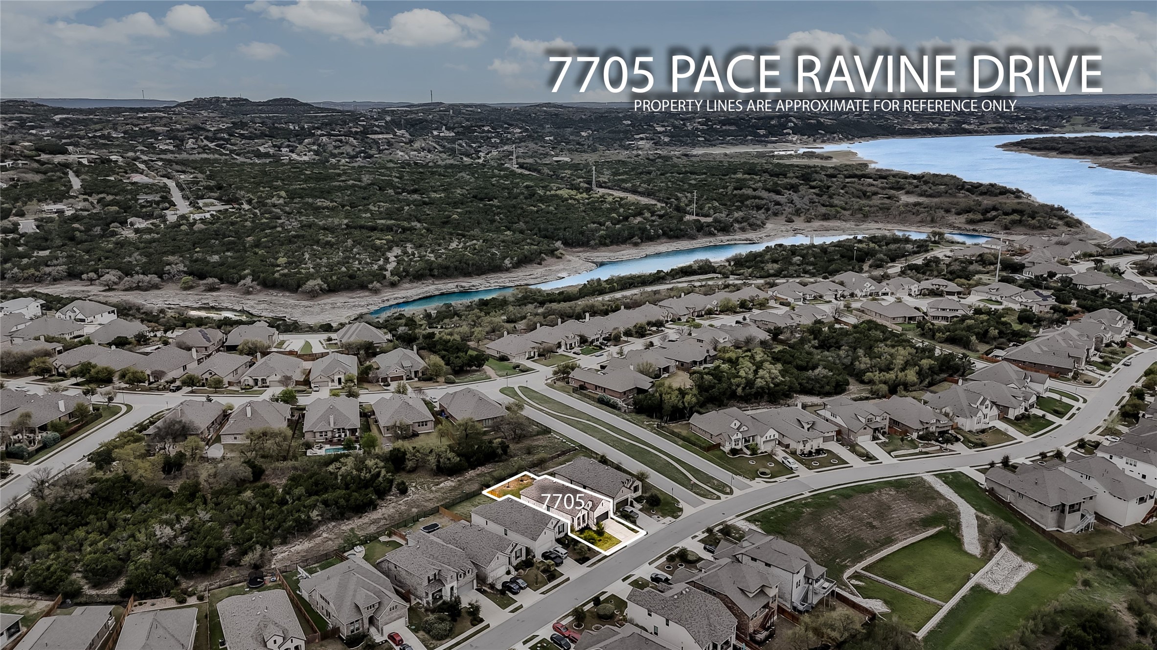 7705 Pace Ravine Drive Lago Vista, TX 78645 - Photo 28 of 40 Aerial perspective of suburban area with a large body of water