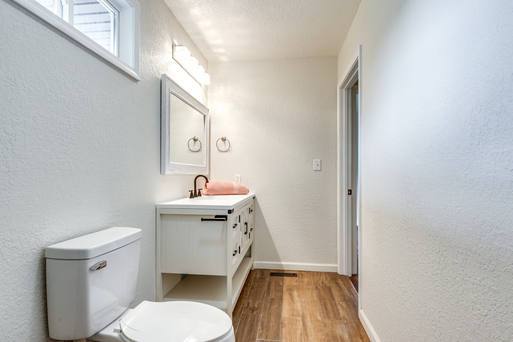 340 Old Spring Creek Road Estill Springs, TN 37330 - Photo 32 of 60 a bathroom with a sink a toilet and a mirror
