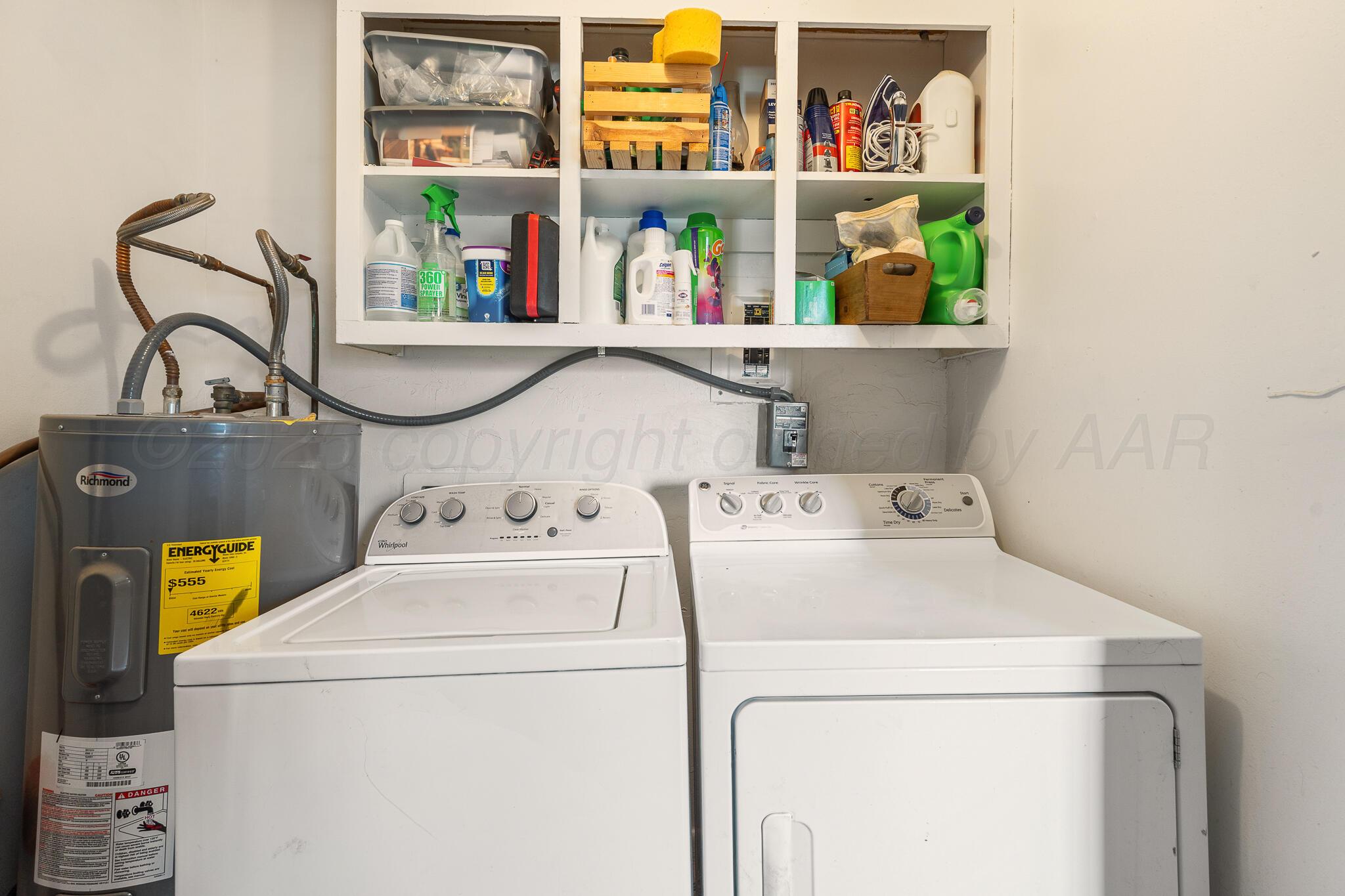 4607 Parker Street Amarillo, TX 79110 - Photo 10 of 11 a utility room with dryer and washer