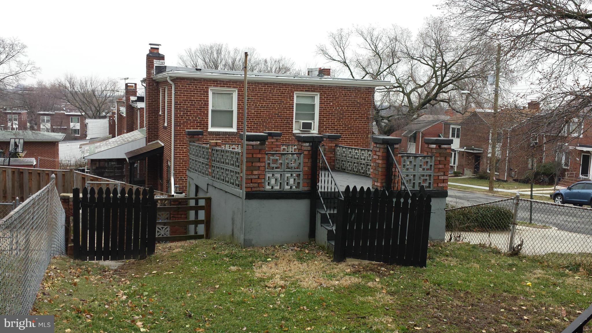 5803 3rd Street Northeast Washington, DC 20011 - Photo 18 of 20 a view of a house with wooden fence