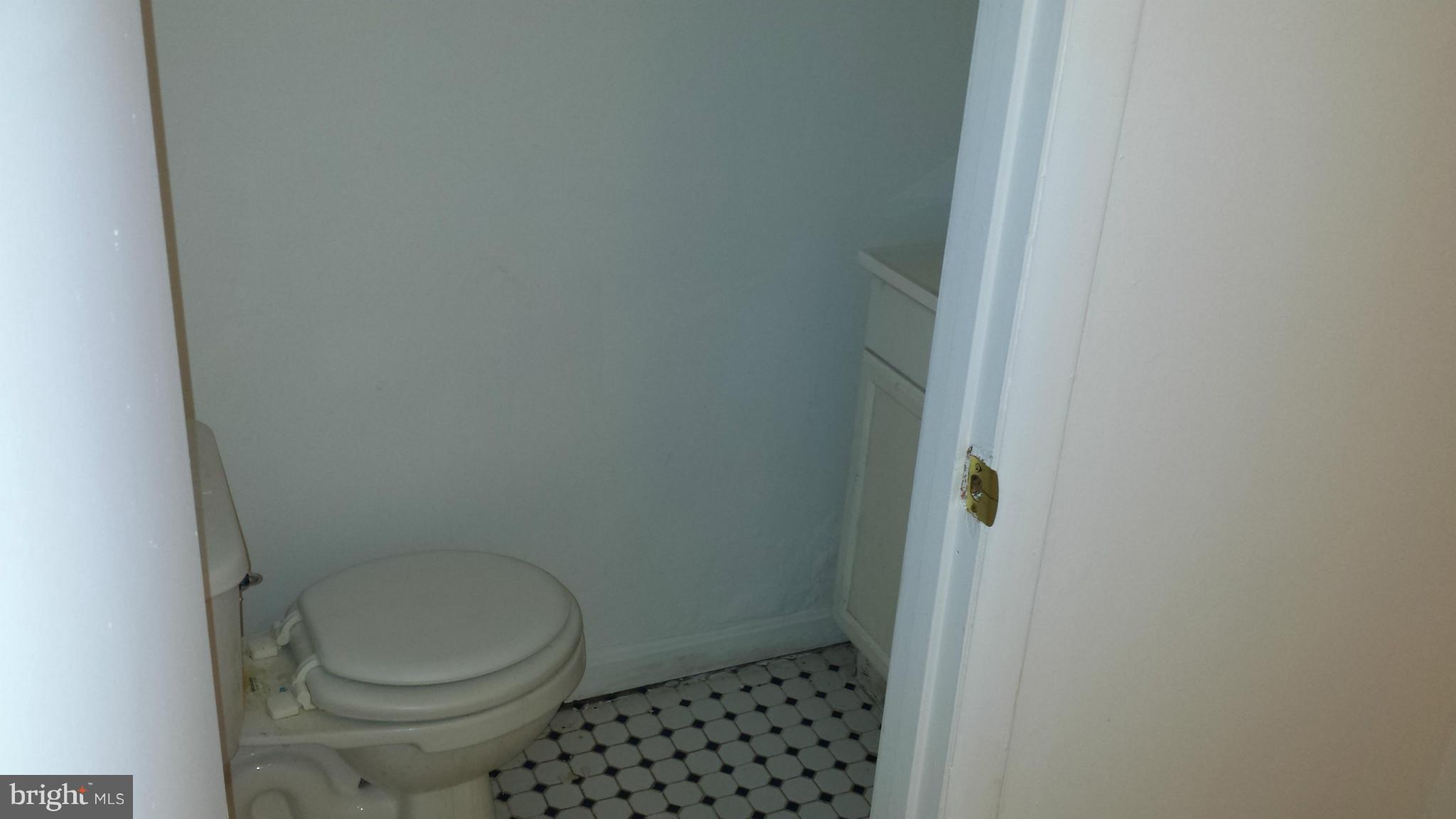 5803 3rd Street Northeast Washington, DC 20011 - Photo 8 of 20 a bathroom with a toilet and a shower