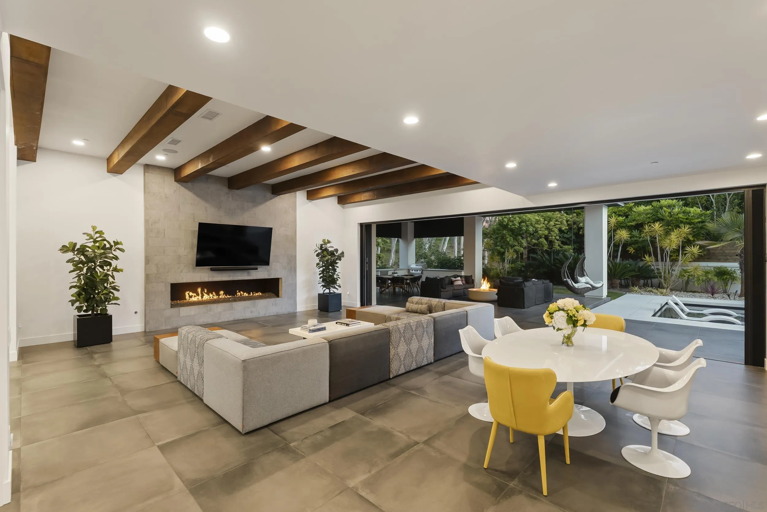 6850 Avenida De La Ronda Rancho Santa Fe, CA 92067 - Photo 1 of 40 a living room with furniture and a flat screen tv