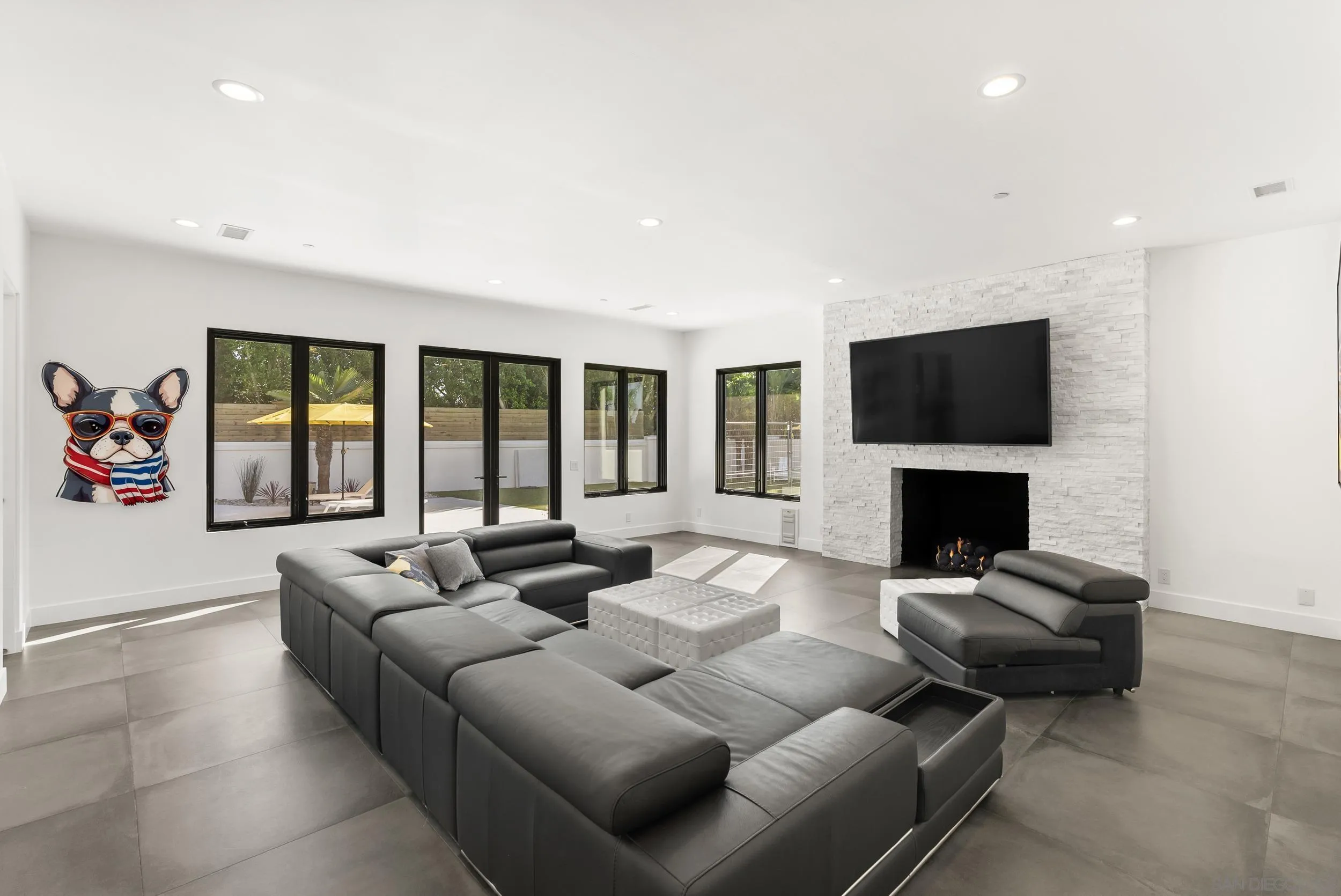 6850 Avenida De La Ronda Rancho Santa Fe, CA 92067 - Photo 16 of 40 a living room with furniture and a flat screen tv