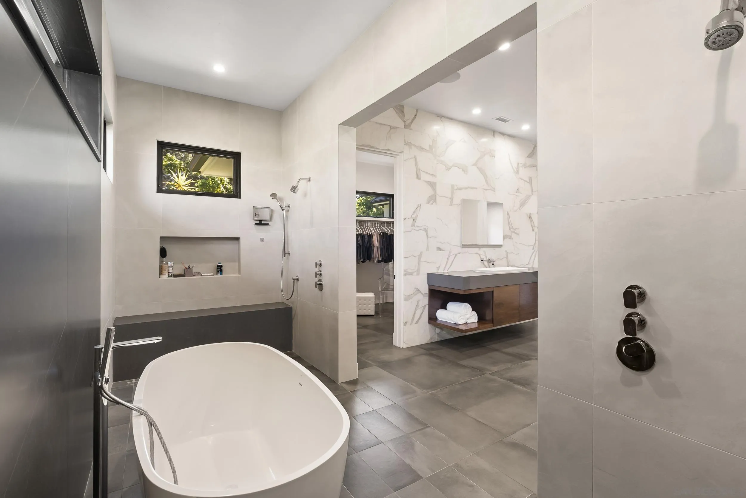 6850 Avenida De La Ronda Rancho Santa Fe, CA 92067 - Photo 21 of 40 a bathroom with a toilet a sink and tub