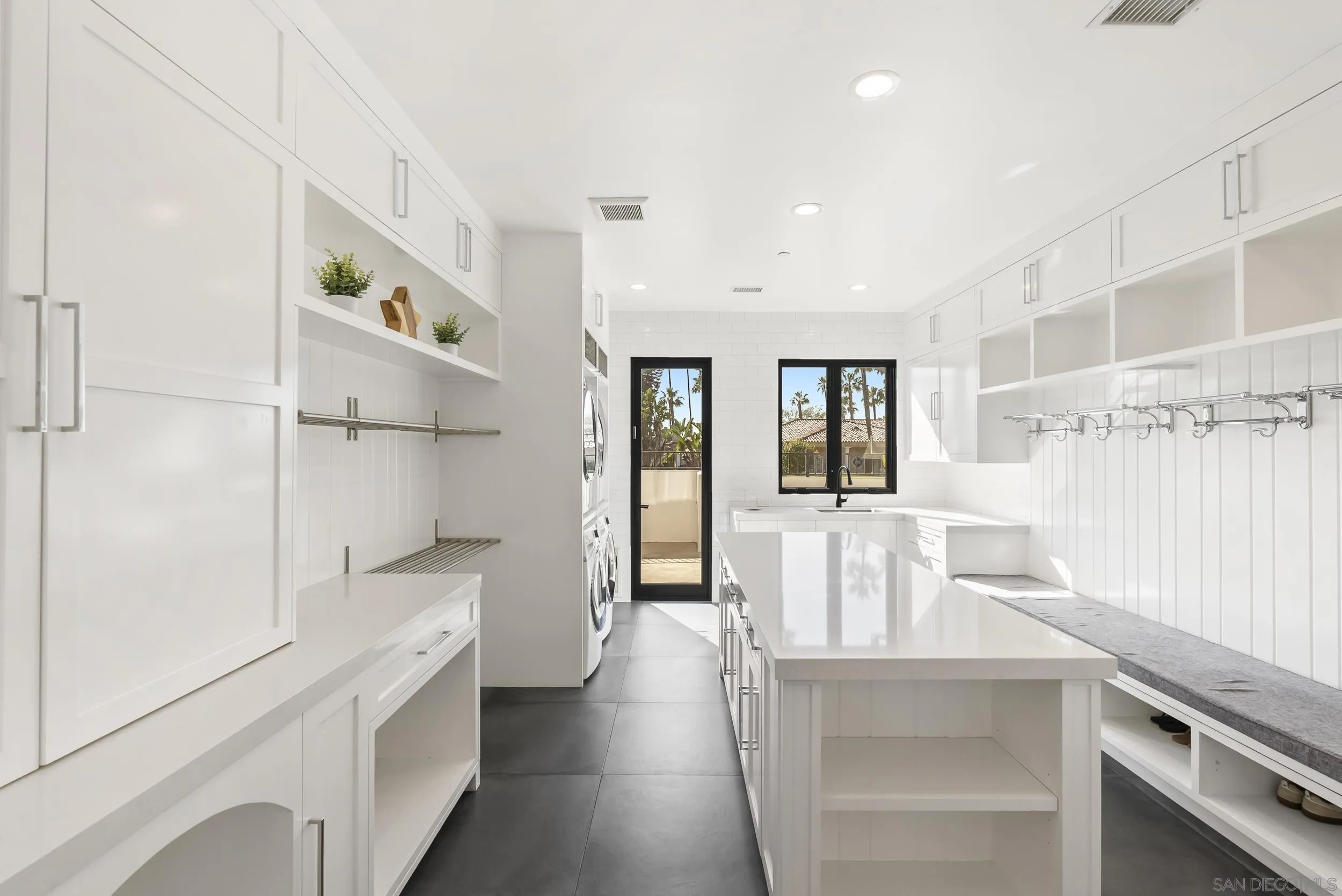 6850 Avenida De La Ronda Rancho Santa Fe, CA 92067 - Photo 22 of 40 a kitchen with a refrigerator and countertop