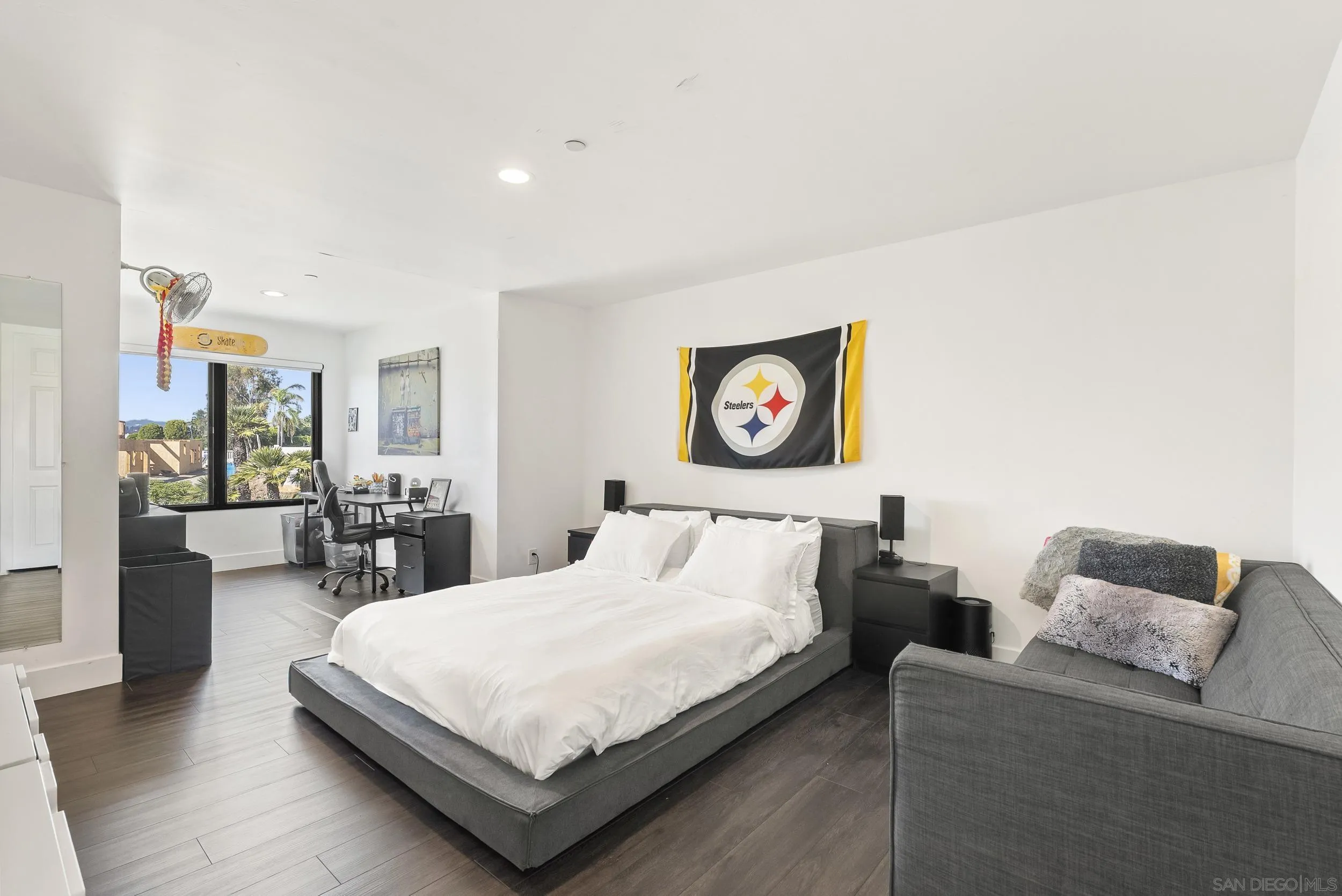 6850 Avenida De La Ronda Rancho Santa Fe, CA 92067 - Photo 28 of 40 a bedroom with a bed and glass wall